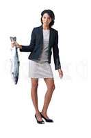 Somethings fishy here.... - Suspicious business deals. Studio shot of a businesswoman holding a dead fish against a white background.