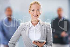 Technology has made our operations more efficient. Portrait of a female factory manager standing with her arms crossed.