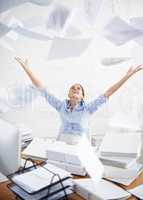 I wish I could be free of all this paperwork. Conceptual shot of a young businesswoman throwing paperwork into the air.