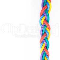 Rainbow ropes. Studio shot ropes knotted together isolated on white.