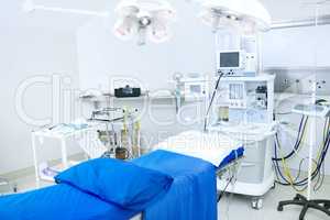This operating room has all the latest technology. An operating room stocked with all necessary medical equipement.