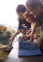 Learning about different sea creatures. Cropped shot of a family on an outing to the aquarium.