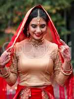 Im ready to meet my groom. Cropped shot of a beautiful hindu bride.