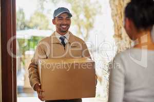 Customer relations are his strong suit. Shot of a delivery man making a delivery to a customer at her home.