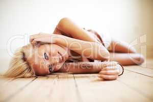 Beautiful and homely. Shot of a gorgeous young woman relaxing at home.