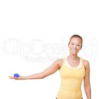 Holding out her stress ball. Cropped view of a woman squeezing a stress ball against a white background.