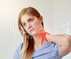Feeling the strain and tension in her neck. Cropped shot of a young woman experiencing neck pain highlighted in glowing red.