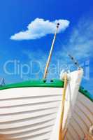 Hop in and go. Closeup shot of a boat against a blue sky.