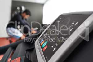 Recording your heart rate. Shot of a cardio equipment at a gym.