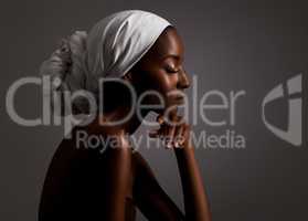 Beauty by tradition. Profile shot of a gorgeous young african woman.