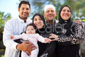 One big happy family. A muslim family enjoying a day outside.