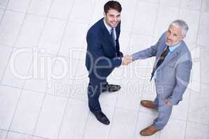 This merger is the start of a great working relationship. Shot of two businessmen shaking hands.
