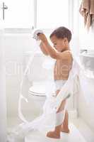Potty training can be a challenge.... Shot of a young boy in the toilet.
