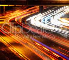 Lights on a busy highway. Shot of a traffic on the motorway.