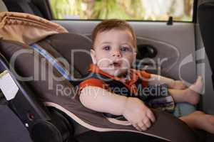 Every baby needs a carseat when traveling. Cropped shot a baby boy in a car seat.