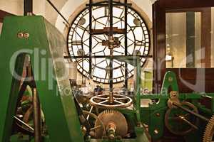 The mechanics of time. Clockwork machinery inside a clock tower.