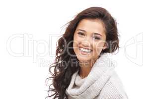 Winter is my favourite season. Portrait of a beautiful brunette in winter clothing smiling at the camera with copyspace.