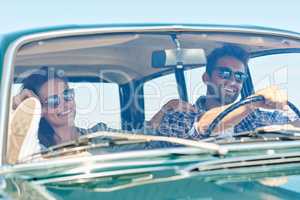 We needed this trip. Cropped shot of an affectionate couple enjoying a summer road trip.