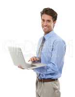 Business info at a key touch. Studio shot of a young businessman using a laptop isolated on white.