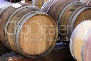 Its wine season. Barrels of wine in a wine distillery.