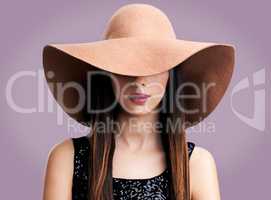 Sleek sophistication. Shot of a beautiful young woman modeling fashion-wear in studio.