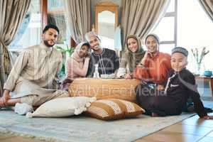 These are the people Im grateful for. Shot of a young muslim family relaxing together during ramadan.