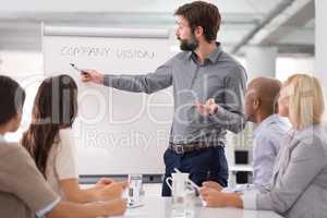 Brainstorming in the boardroom. Shot of a group of businesspeople in the boardroom.