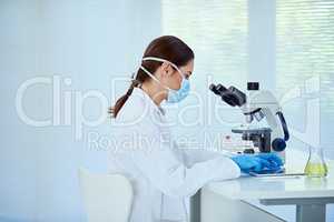 Shes considered a leading expert in her field. Shot of a female scientist working alone in the lab.