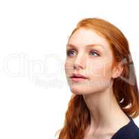 Things are looking up. Studio shot of an attractive redhead isolated on white.