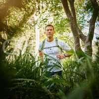 Trail running- all about the experiences along the way. Shot of a young man running along a nature trail.