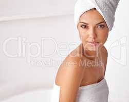 Cleanliness is he basic of beauty. Portrait of a beautiful young woman wrapped in a towel.