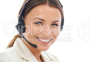 Assistance is her speciality. A close-up studio shot of a smiling female operator wearing a headset isolated on a white background.