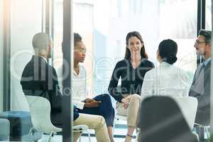 What can you contribute to this team. Shot of a diverse group of businesspeople having a meeting in the boardroom.