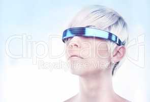 Envisioning the future. A futuristic view of a young woman with glasses.