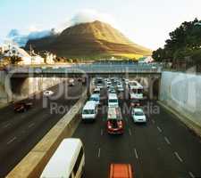 Home time in the city. Shot of a traffic on the motorway.