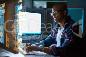 Encoding in progress. Cropped shot of a young male programmer working on computer code in his office.