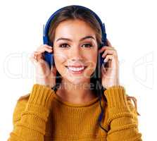 Music is the universal language of mankind. Studio shot of a young woman wearing headphones against a white background.