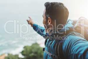 Theres always plenty more to show in nature. Shot of a middle aged man looking at the view on top of a mountain.