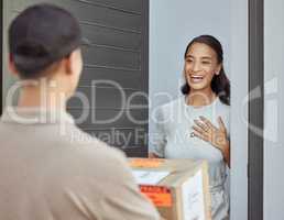 Hi I believe I have a delivery for you. Shot of a young woman receiving an order.