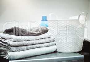 Keeping laundry clean and fresh. Still life shot of linen and a laundry basket on a washing machine.