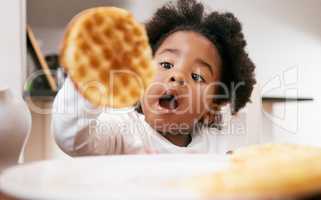 Big girls get big waffles. Shot of a little girl about to eat a waffle.