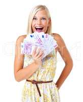 Can you believe it. Pretty woman fanning out euro notes looking stunned and amazed - isolated.