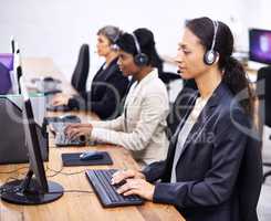 Theyve always provided great service. Cropped shot of three female call center representatives wearing headsets.