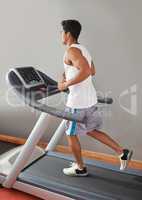 The heart also needs a workout. A young ethnic man running on a treadmill.