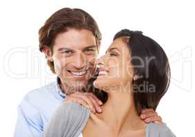 Hes a dream. Head and shoulders portrait of a happy young couple isolated on a white background.