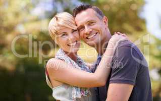 Nurturing our love. Shot of a mature couple embracing outdoors.