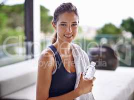 What a wonderful workout. Portrait of an attractive young woman relaxing after a workout.