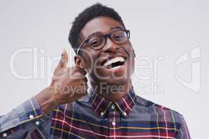 Im happy to approve. Studio portrait of a handsome young man giving a thumbs up against a grey background.