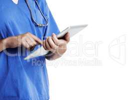 Medical records on the move. Cropped studio shot of a doctor using a digital tablet against a white background.