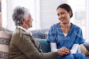 Im here to lend my support whenever you need. Shot of a young nurse chatting to a senior woman in a retirement home.